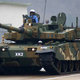Illustration for article titled Koreas Black Panther Battle Tank Shoots Parachute Bombs